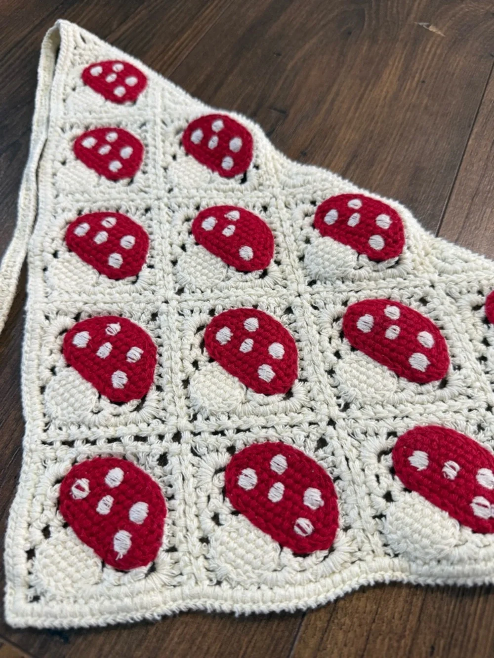 Crocheted Triangle Scarf with Red Mushroom Motif